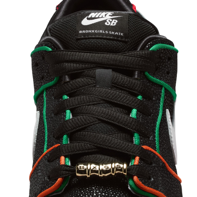 Black NIKE SB dunk low bronx girls skate sneaker with colorful accents on a white background