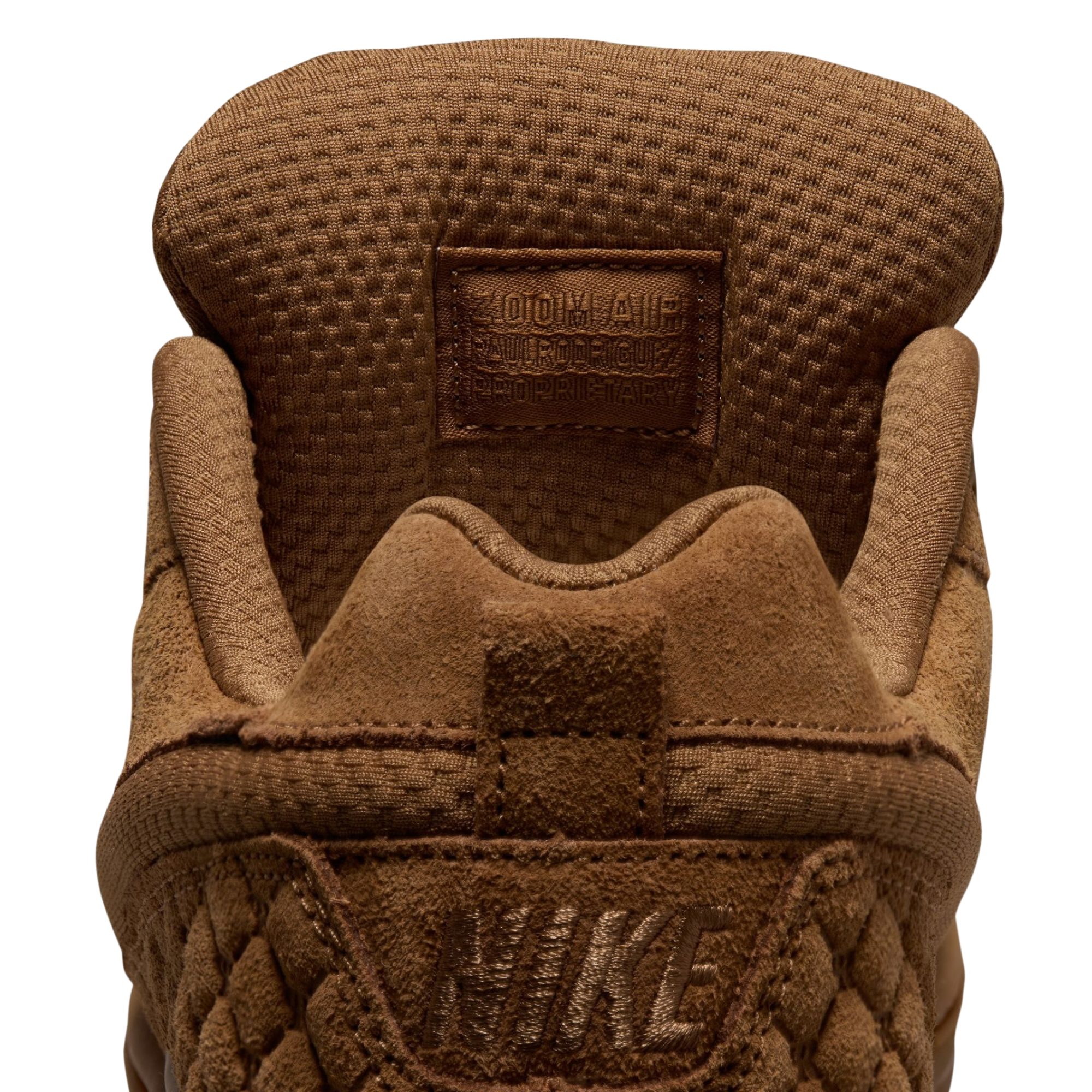 all tan nike sb paul rodriguez skateboard shoe on a white background
