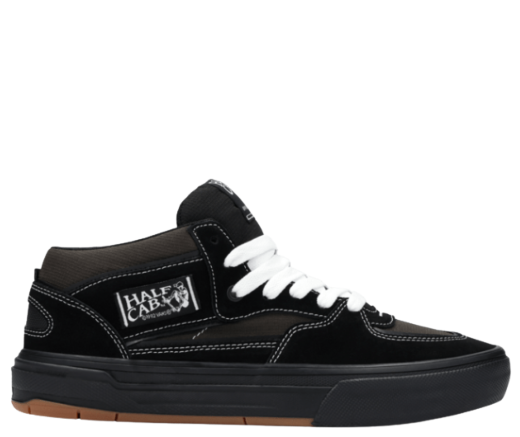 Black  vans united by skateboarding half cab mid-top sneaker with white laces on a white background