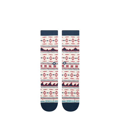 white stance rising tide crew socks with blue and red design on a white background