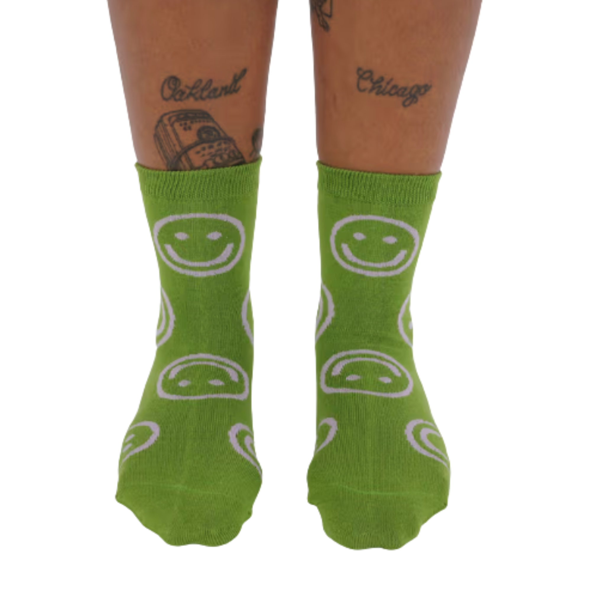 Green baggu crew socks with pink smiley face patterns on a white background