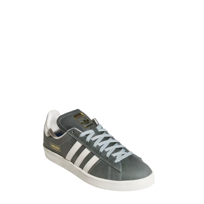 Green Adidas women's campus adv sneaker with white stripes on a white background
