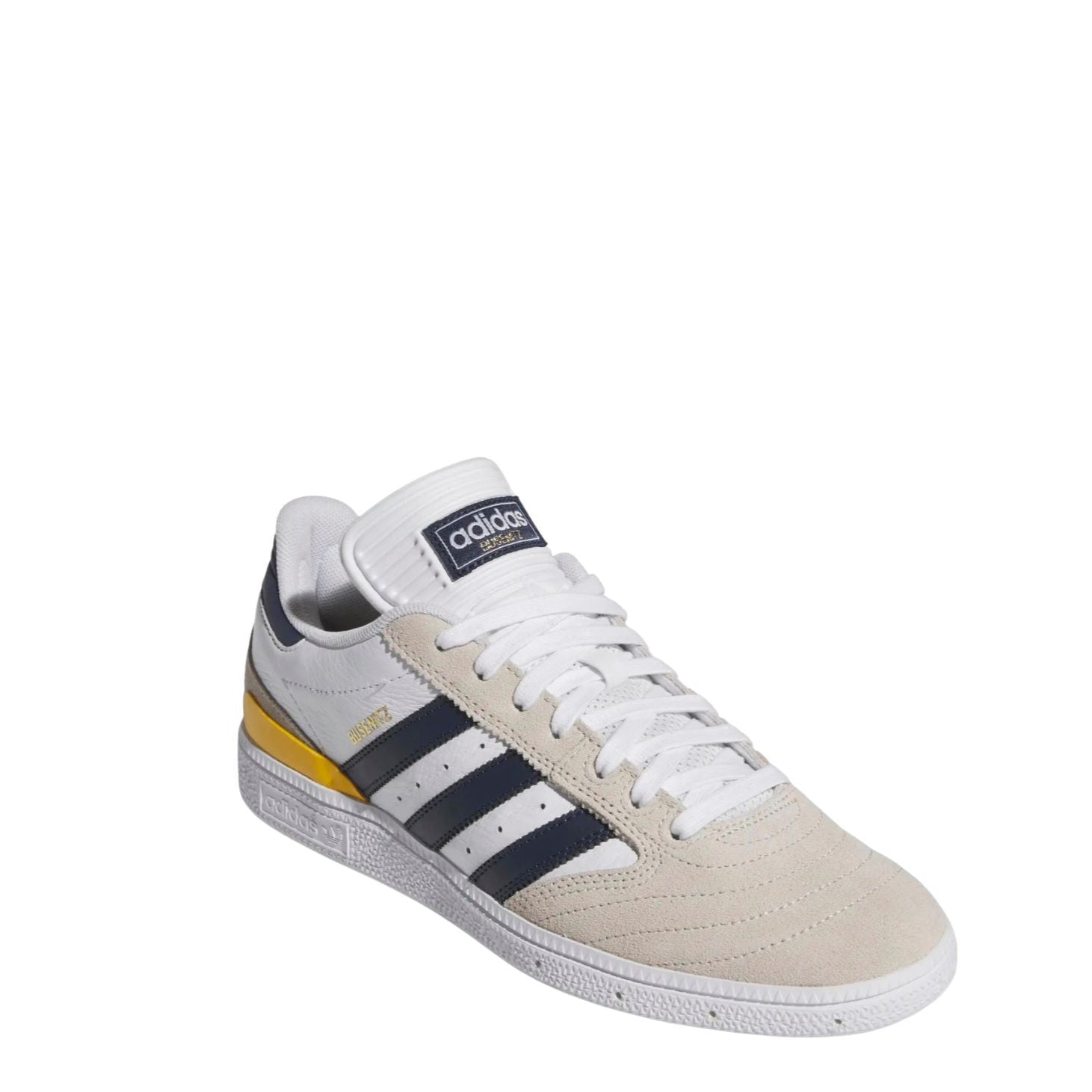 White adidas busenitz pro skateboard sneaker with navy stripes and yellow accent on a white background