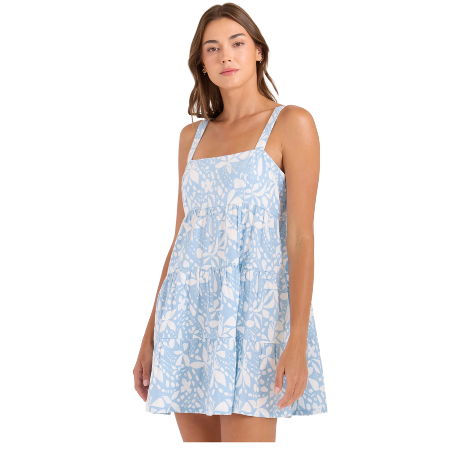 blue & white volcom floral mini dress on a white background