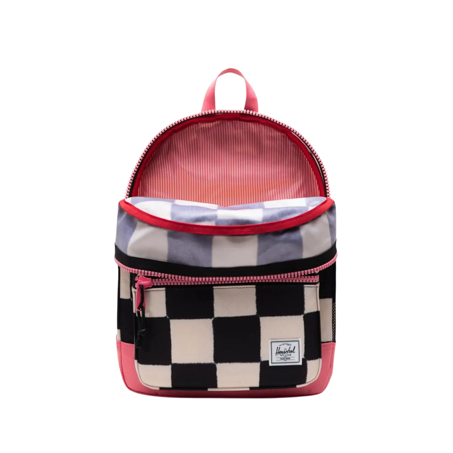 black and white checkerboard herschel kids heritage backpack with pink accents