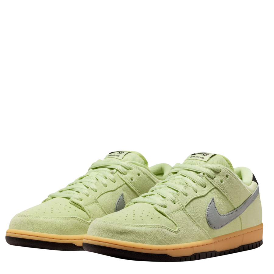 Light green nike sb verdugo mountains nike sb dunk low sneaker with a gray swoosh logo on a white background