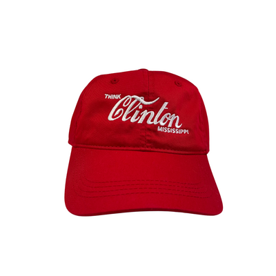 Red cap with white think clinton mississippi text on a white background