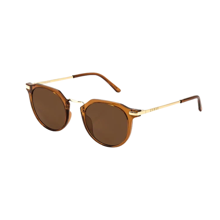 Round carve usa eyewear sunglasses with translucent amber-brown frames and dark brown lenses, featuring small gold metal accents on the hinges, shown against a plain white background.