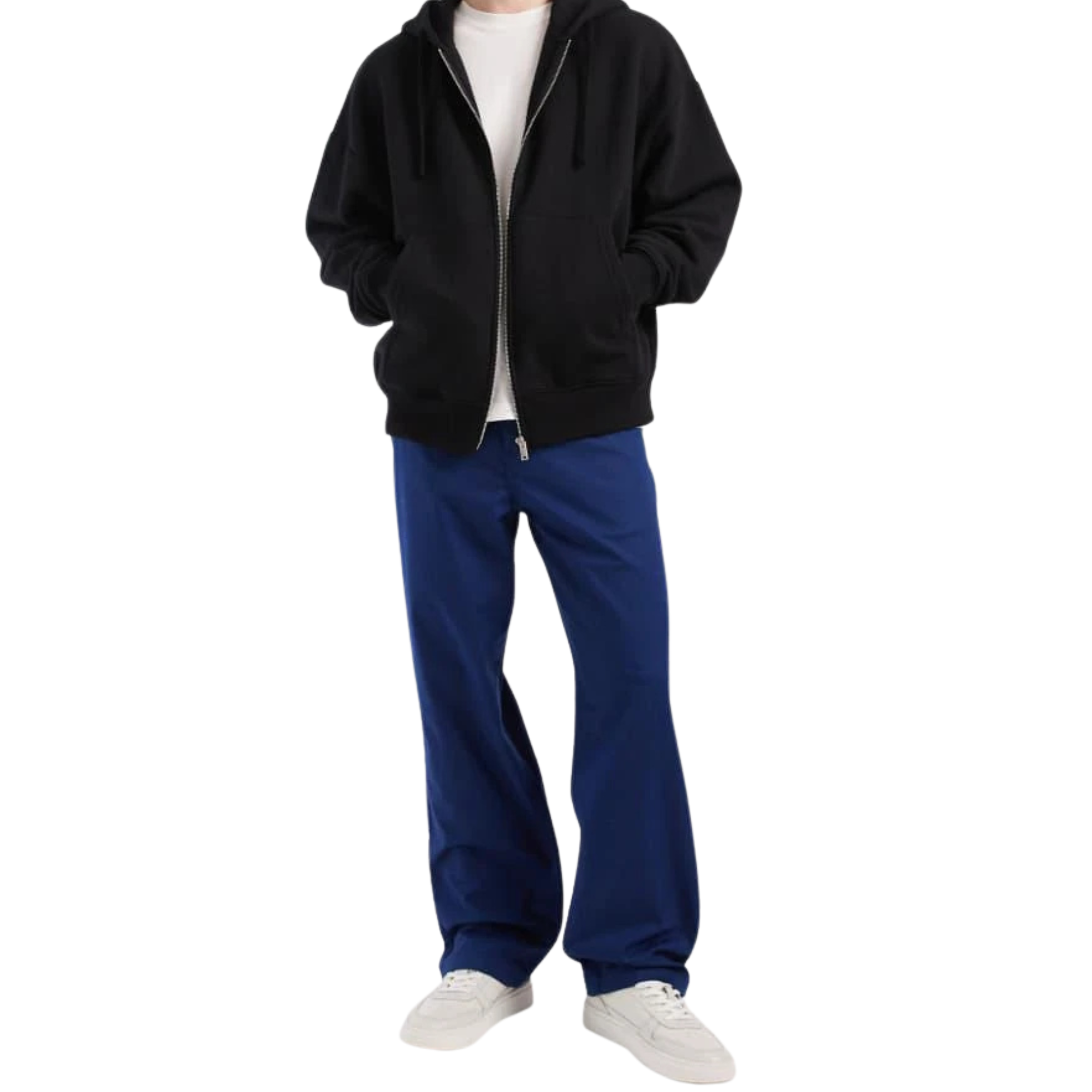Person wearing a black hoodie, white shirt, blue vans pants, and white shoes on a white background