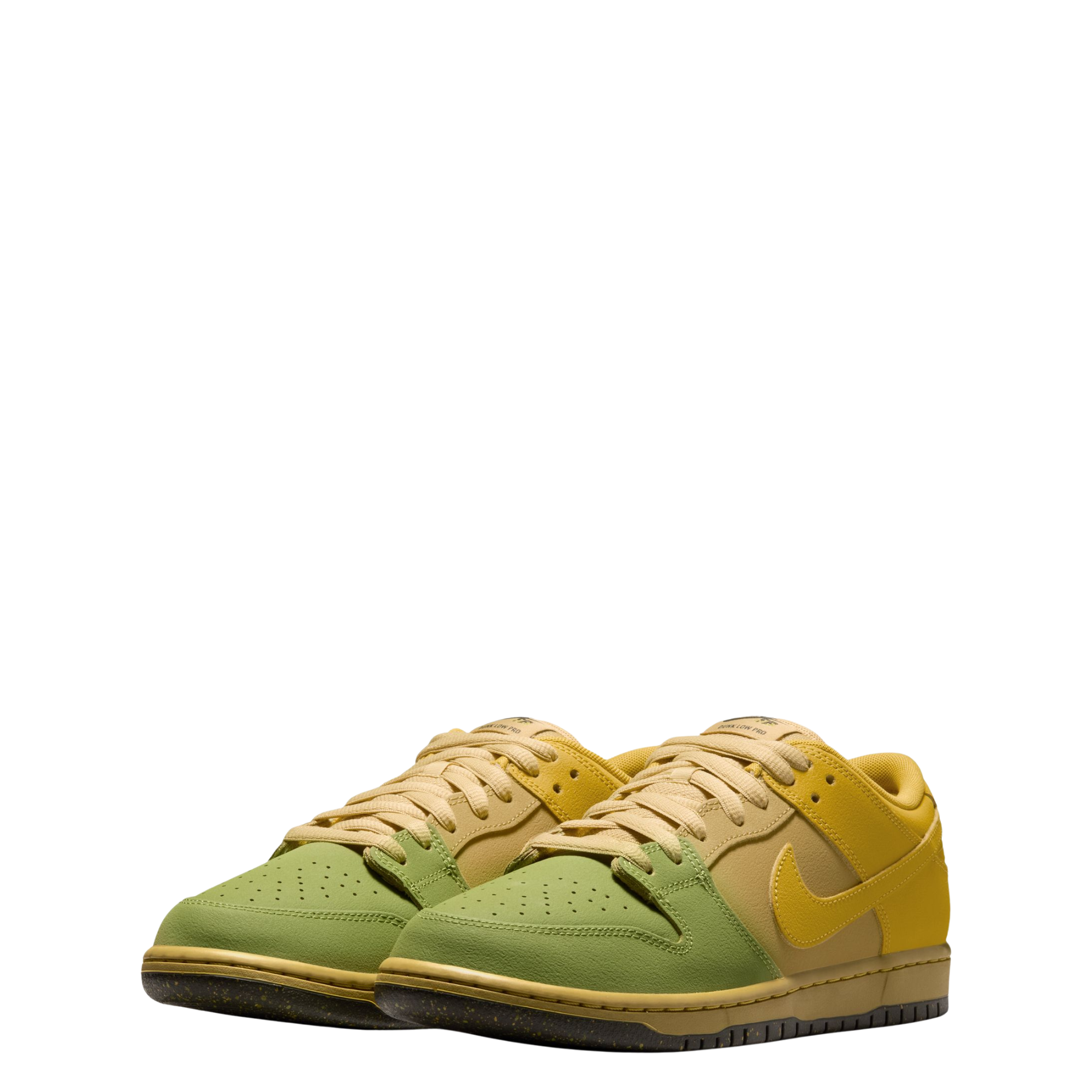 A Nike SB Saffron Dunk Low sneaker in a yellow, tan, and sage green colorway, shown from a side profile view against a plain white background.