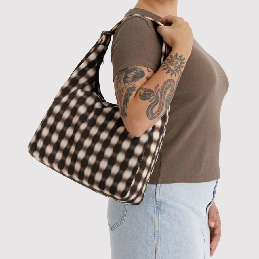 blurred gingham baggu nylon shoulder bag on a white background