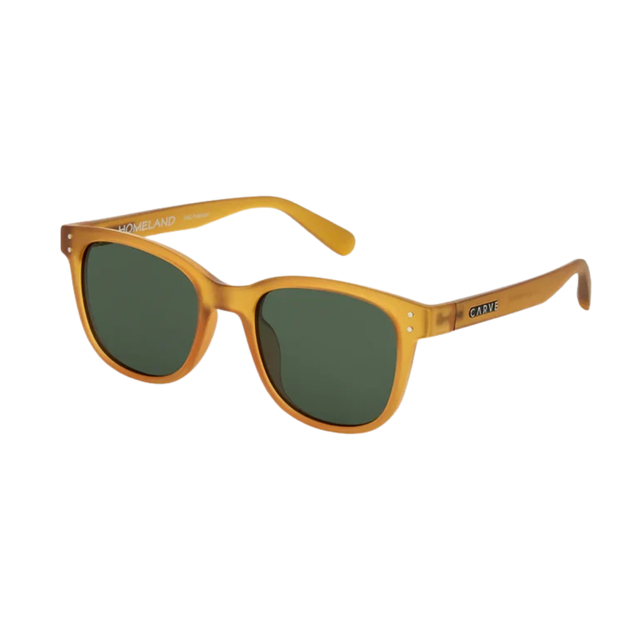 A pair of square carve usa eyewear homeland sunglasses with a translucent amber-yellow frame and dark green lenses, shown against a plain white background.