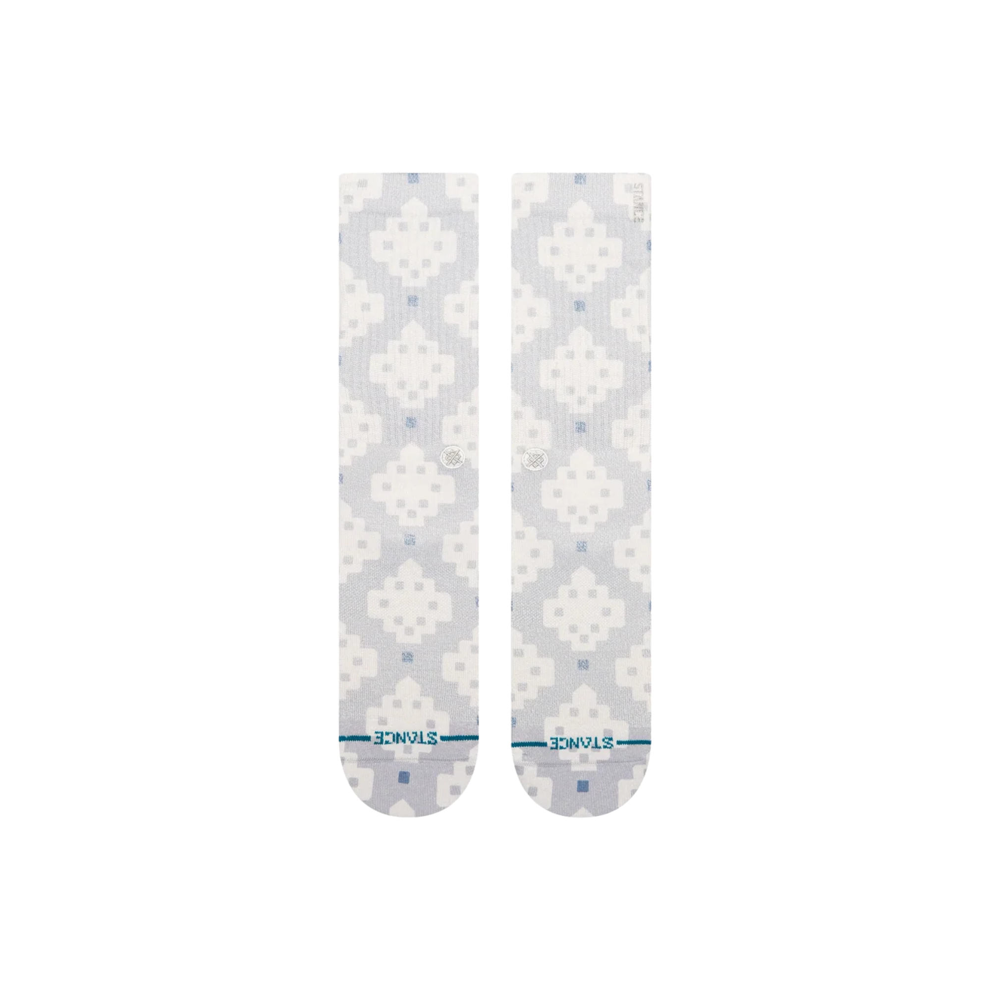 A pair of Stance alhambra butterblend crew socks with a light gray and white pixelated geometric pattern, featuring a small blue logo and 'STANCE' branding on the toes.