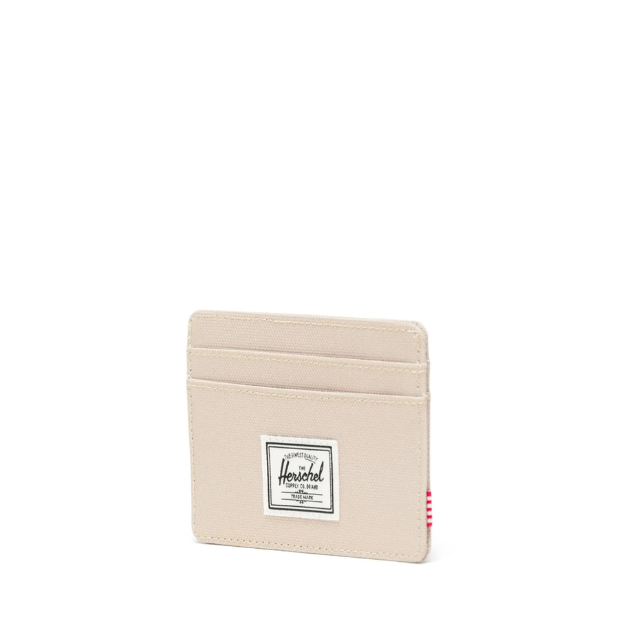 khaki herschel charlie front pocket card wallet on a white background