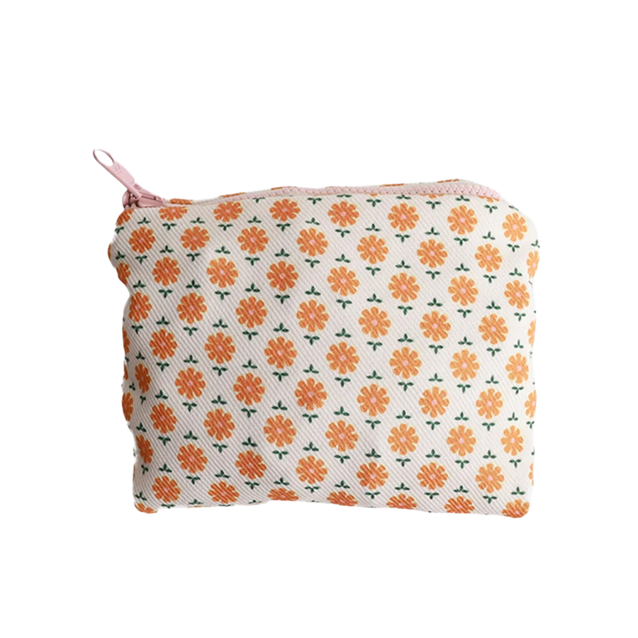 A slouchy thread shoulder bag with a white base and an all-over orange and yellow floral pattern, featuring a single adjustable shoulder strap.