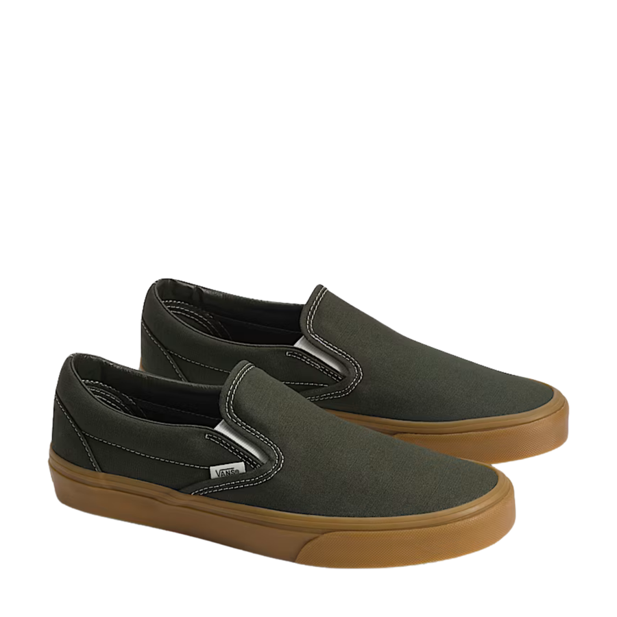 dark green vans mens slip-on sneaker with brown sole on a white background