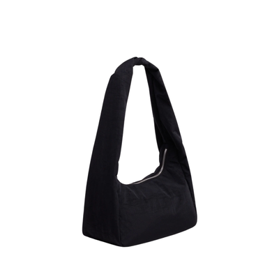 A black slouchy baggu nylon meringue shoulder bag with a single strap, photographed against a solid white background.