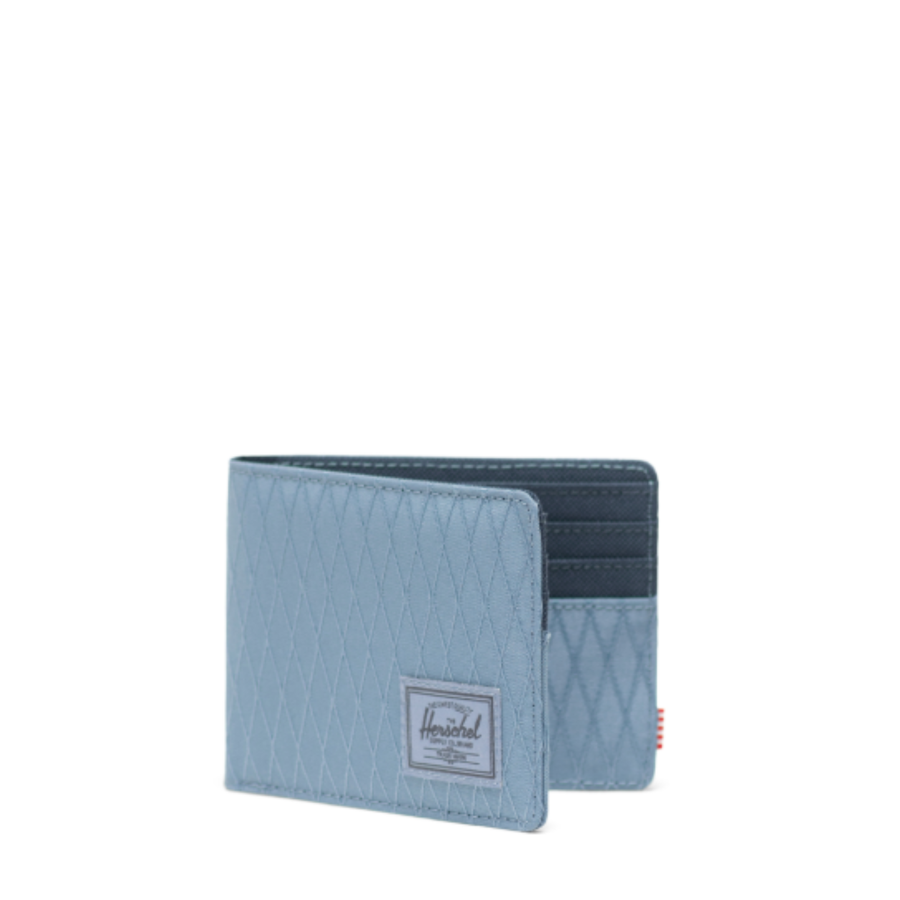 blue herschel roy wallet on a white background