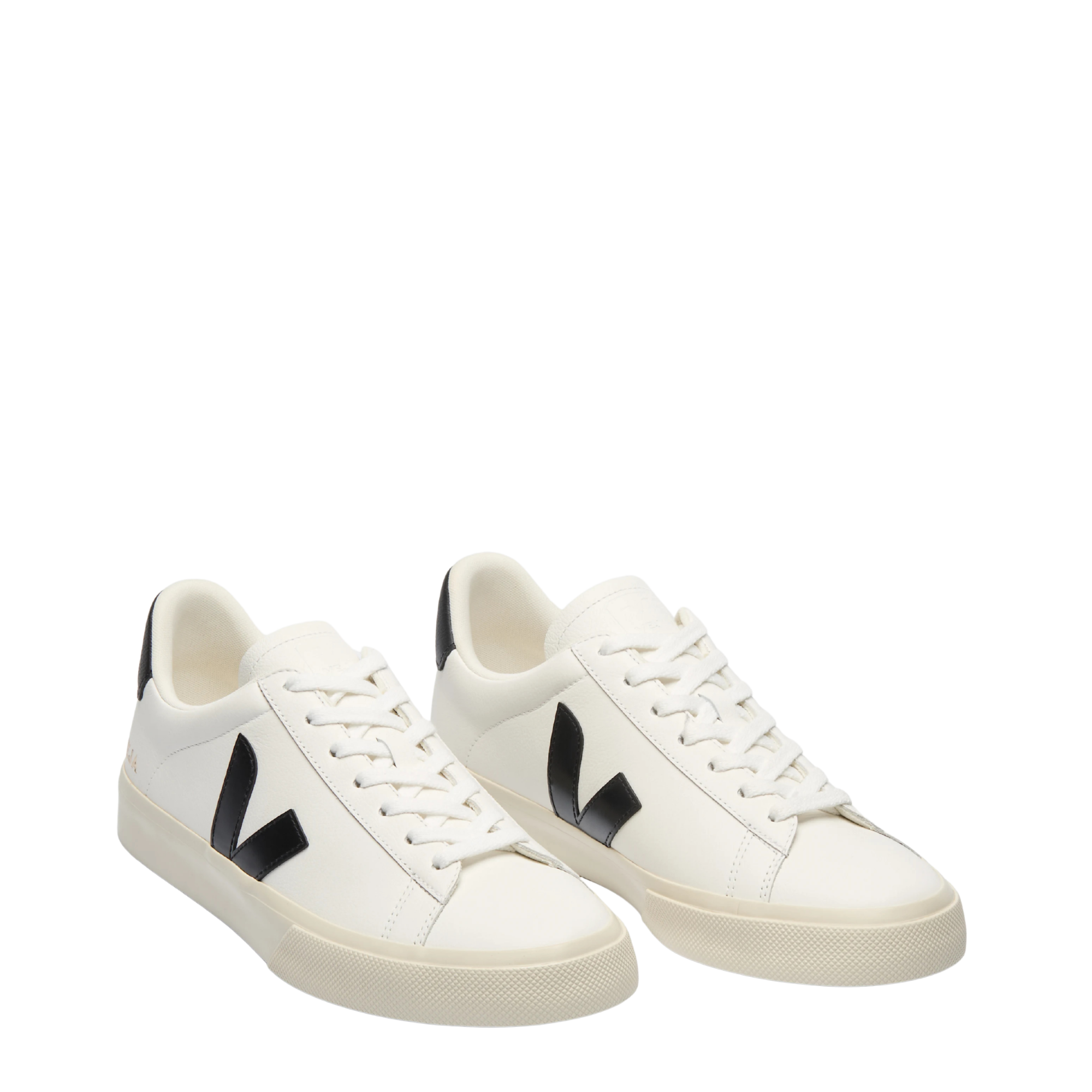 white veja campo leather shoes with black V and off white sole on a white background