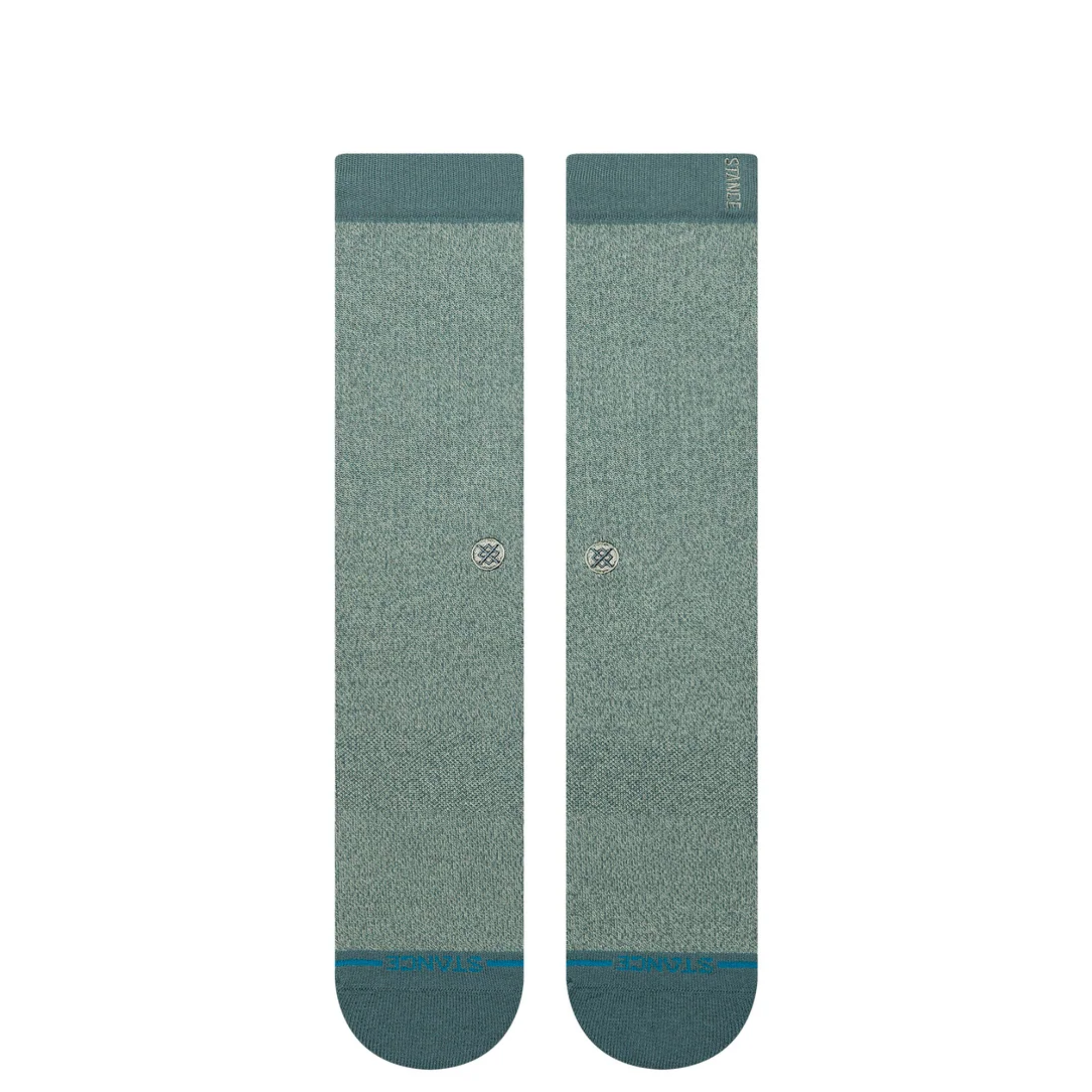 green stance butter blend crew socks on a white background