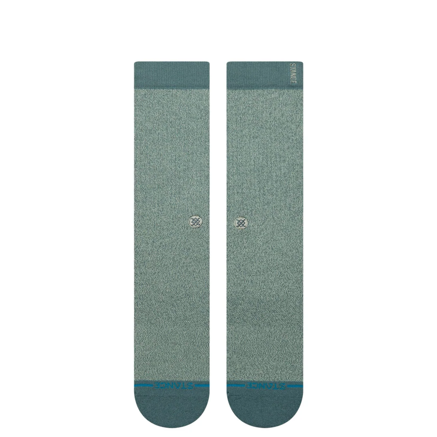 green stance butter blend crew socks on a white background