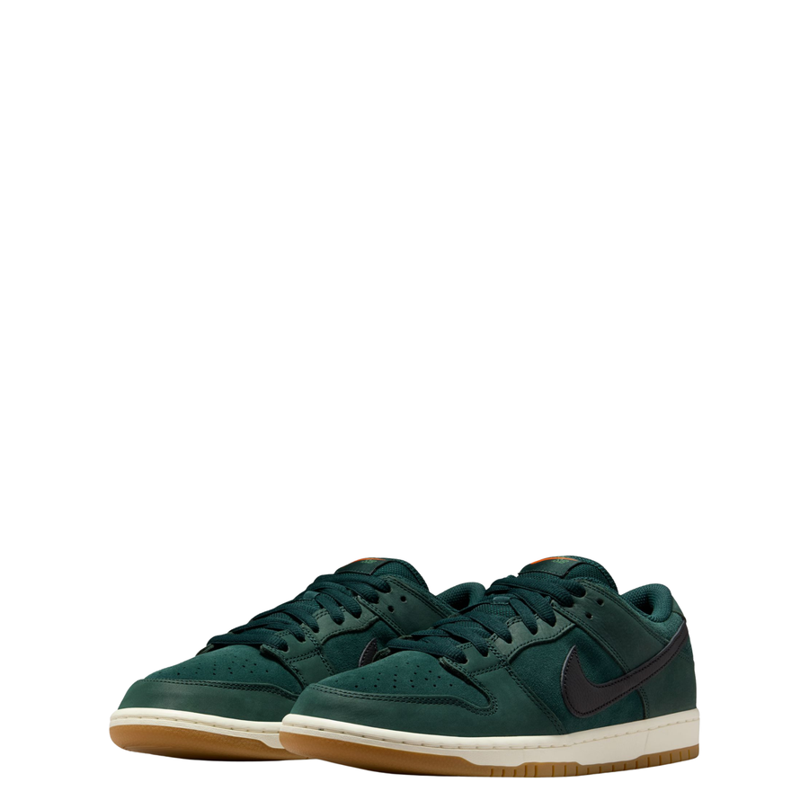 Green nike sb orange label dunk low sneaker with a black swoosh logo on a white background