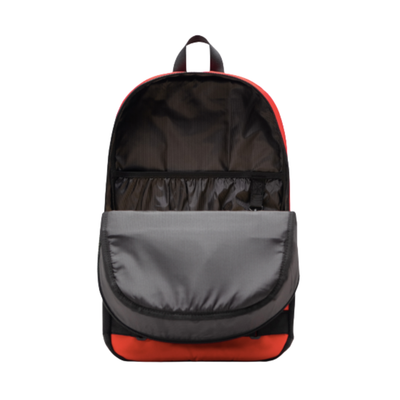 red herschel fleet skateboard backpack with black straps on a white background