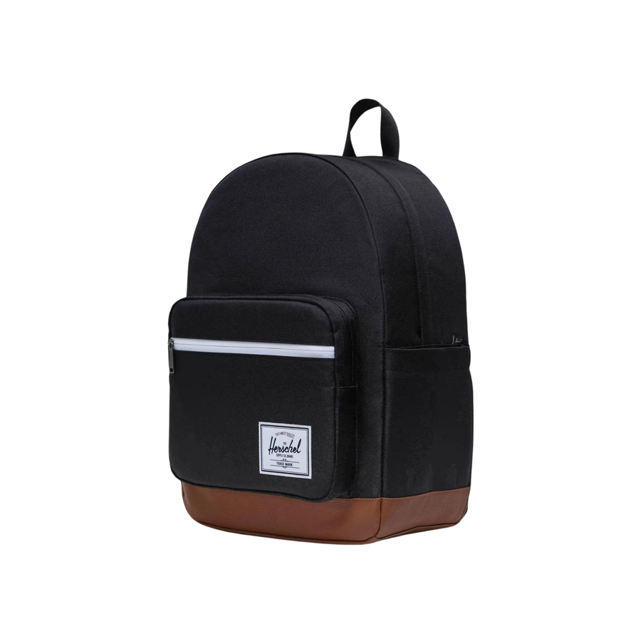 black herschel pop quiz backpack with white zipper and brown bottom