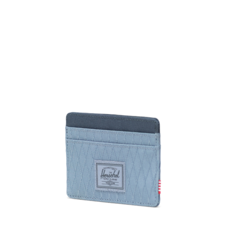 2 tone blue herschel charlie front pocket card wallet on a white background