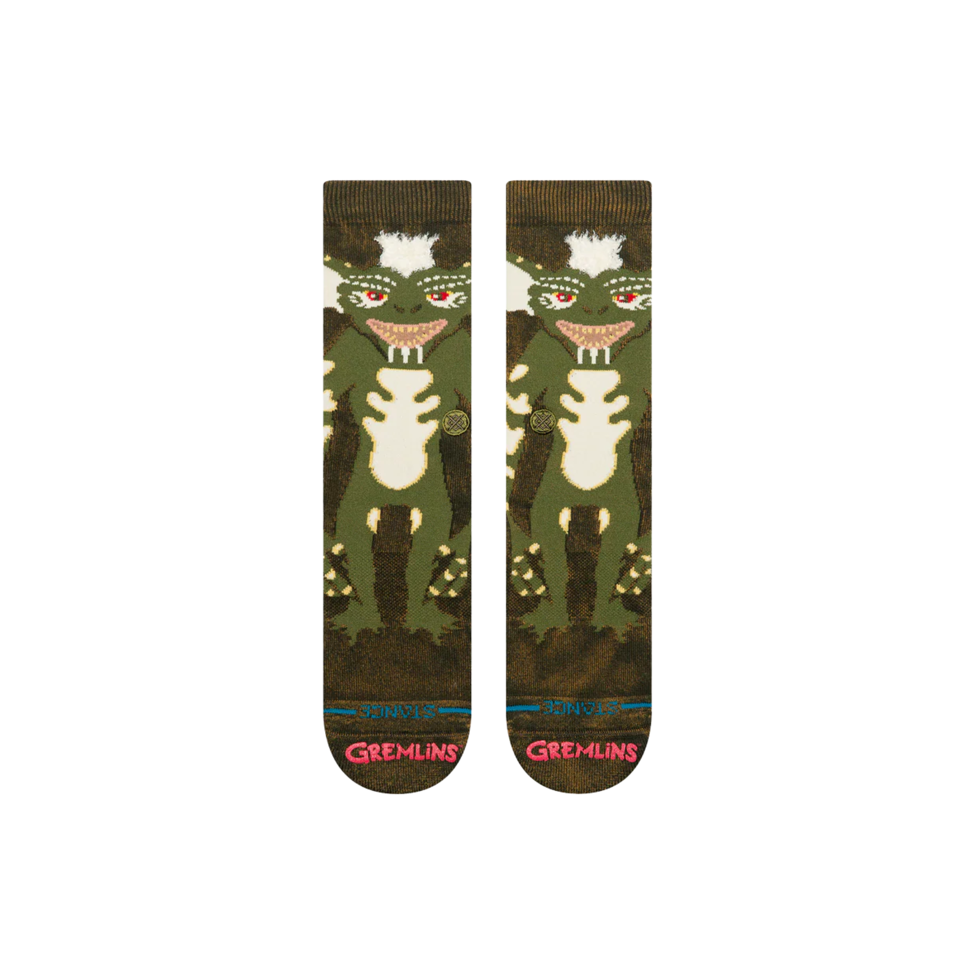 A pair of stance gremlins crew socks featuring a green and brown stripe from gremlins design on the upper leg, red eyes, and 'stance' printed in red on the toes.