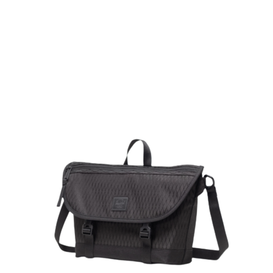 Black PATTERNED herschel messenger bag on a white background