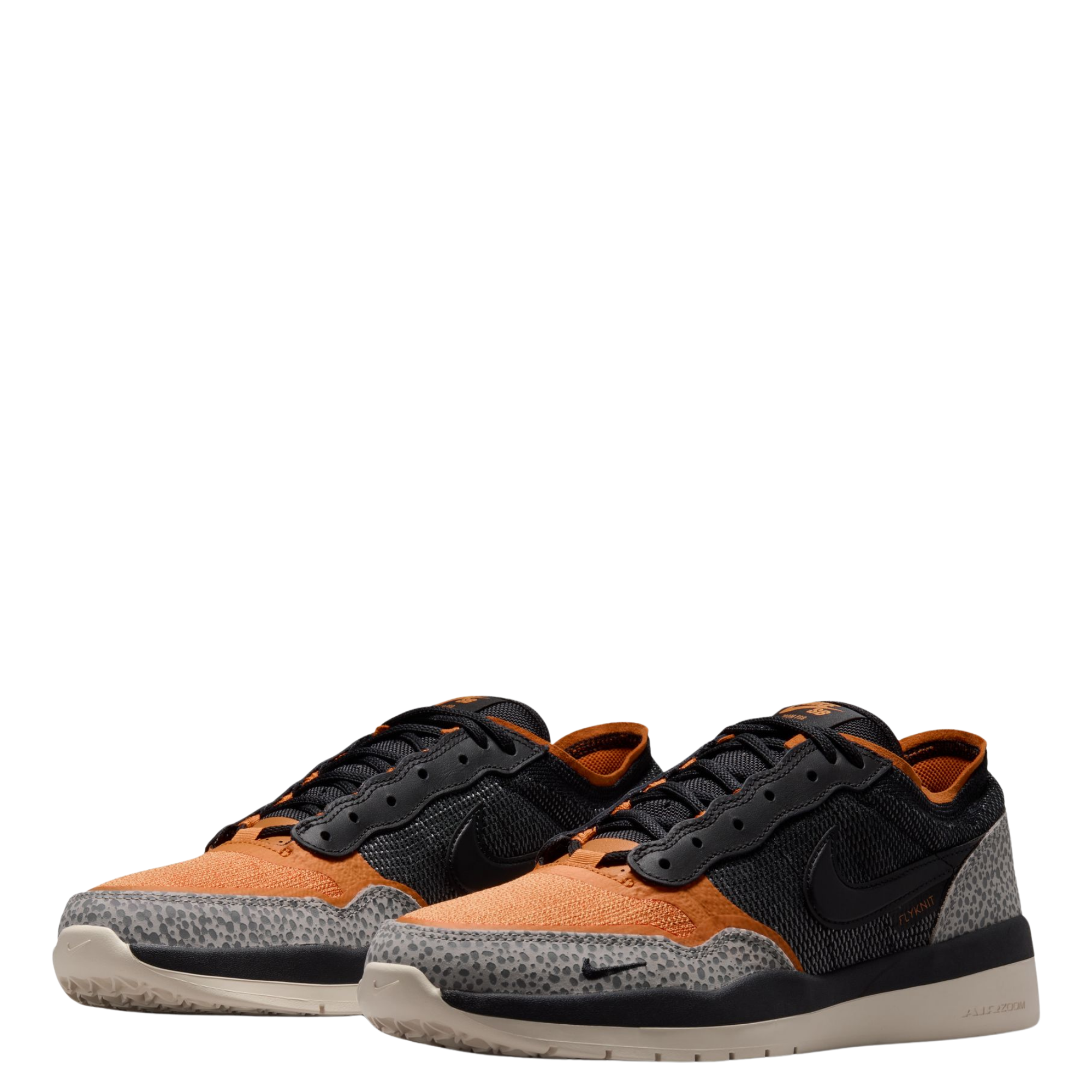 A pair of Nike SB PS8 skateboard sneaker in black, orange, and gray leopard print,  shown from a three-quarters angle on a plain white background.