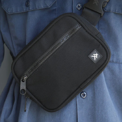 Black thread belt bag with a visible brand logo on a white background