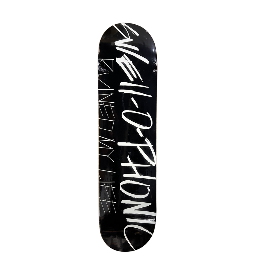 Black skateboard deck with SWELL-O-PHONIC ruined my life in white text on a white background