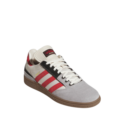 White & grey Adidas busenitz pro sneaker skateboard shoe with red and black stripes on a white background