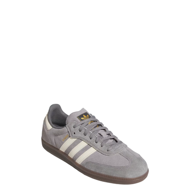 Gray Adidas samba adv skateboard sneaker with white stripes on a white background