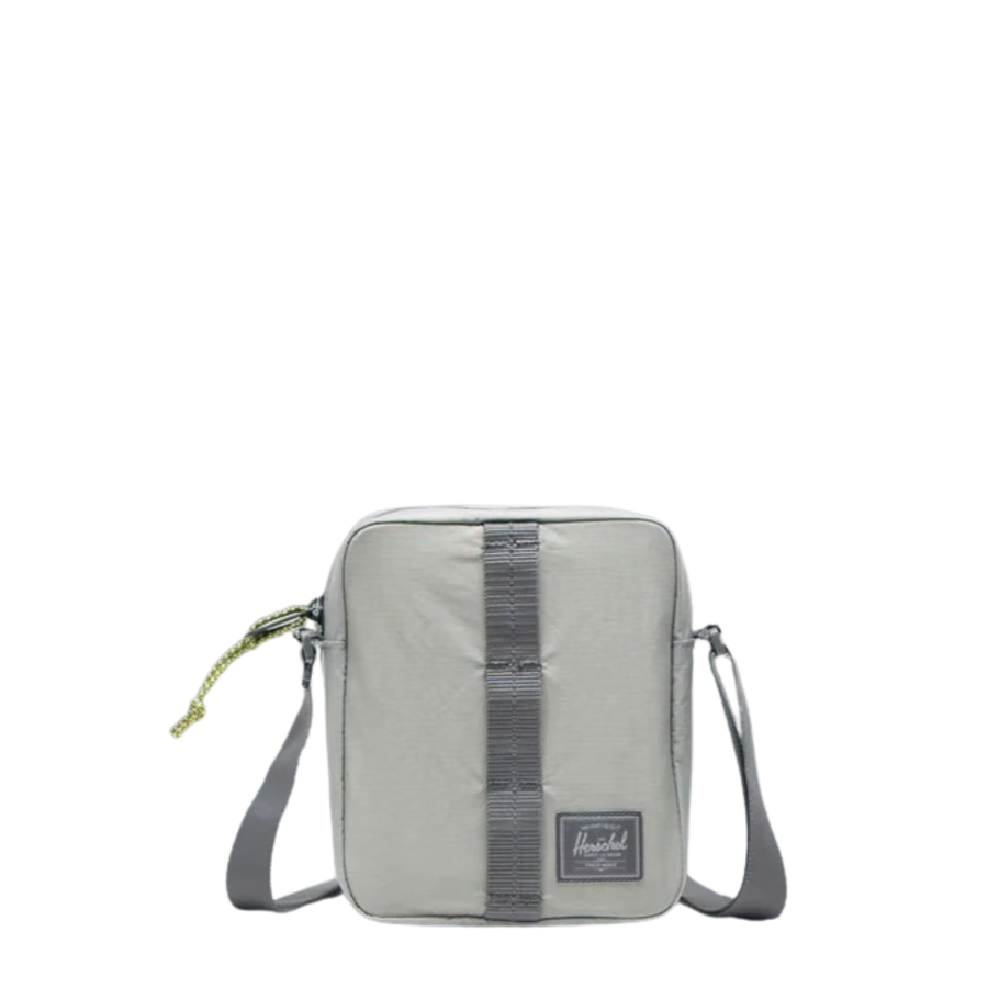 grey reflective herschel ripstop heritage crossbody bag on a white background