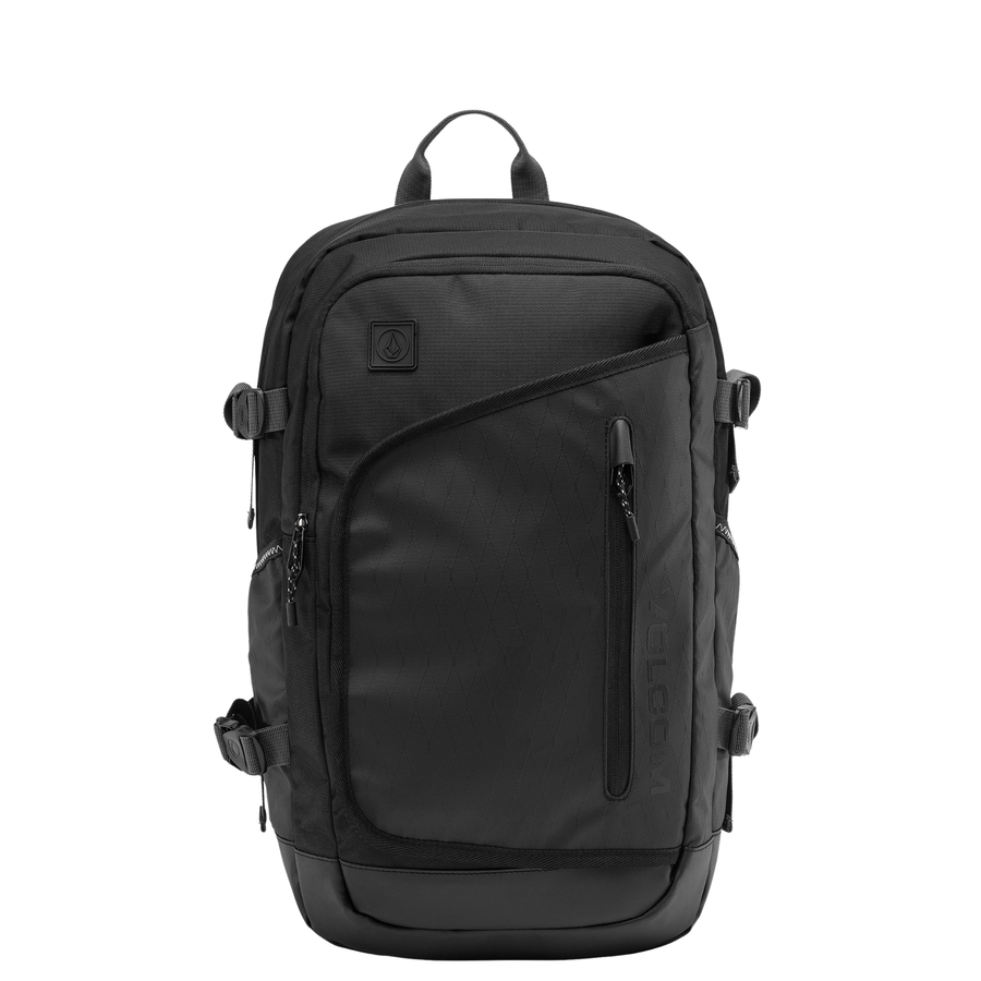 A black outdoor volcom short range backpack with multiple zippered compartments, side pockets, and adjustable straps, shown against a plain white background.
