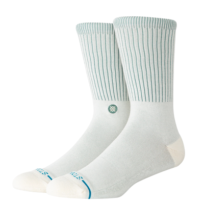 White stance icon socks with green stripes on a white background