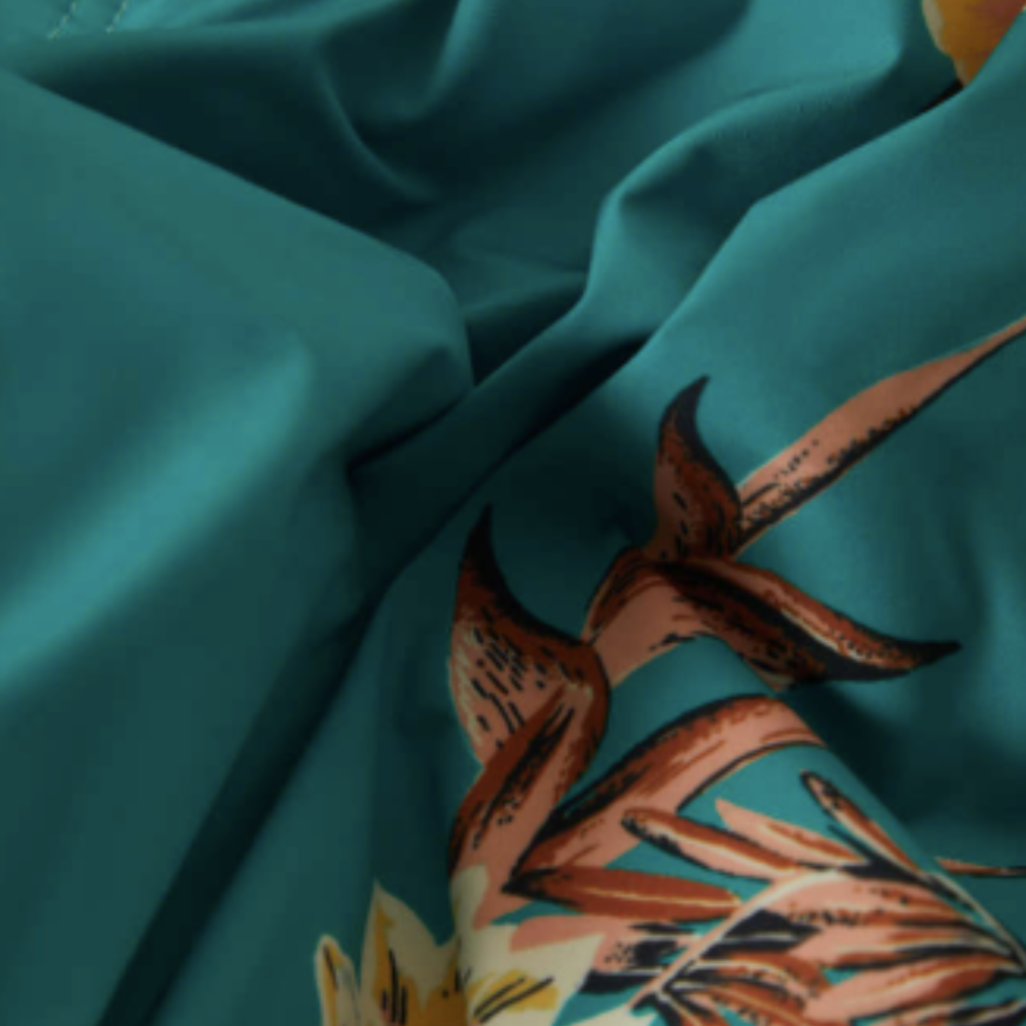 Floral patterned brixton classic men's swim trunks 17" shorts on a white background