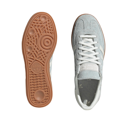 Light blue Adidas handball spezial sneaker with white stripes on a white background