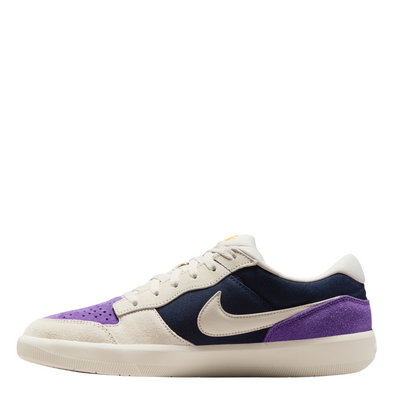 nike sb women's force 58 Sneaker with purple and navy accents on a white background