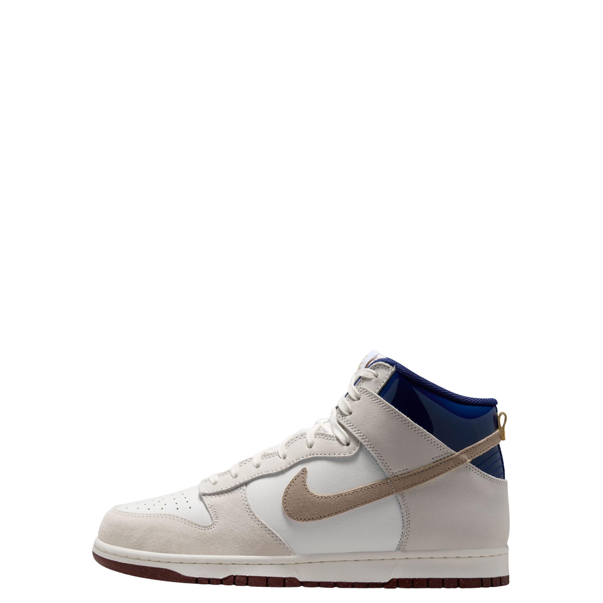A A Nike SB X Beyond Skate Shop high-top sneaker in off-white and light gray suede, featuring a tan Swoosh, a dark blue collar lining, and a brown gum outsole, shown from a side profile on a white background.
