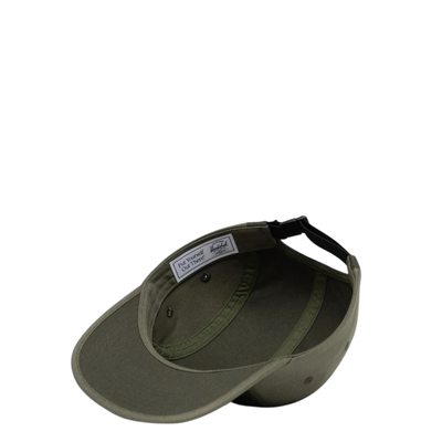 inside view of a two tone green herschel glendale cap hat on a white background