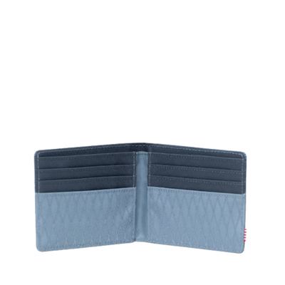 blue herschel roy wallet on a white background