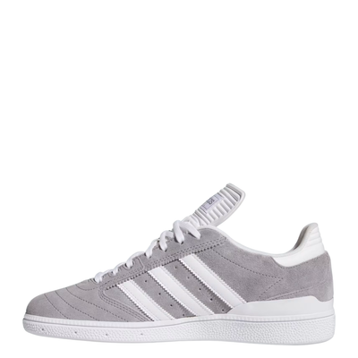 Gray Adidas busenitz skateboard sneaker with white stripes on a white background