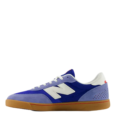 team blue new balance numeric 440v2 with red accents and gum sole