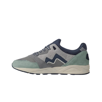 Gray and green karhu aria 95 legends sneaker with 'Karhu' branding on a white background