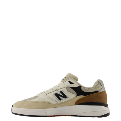 tan and brown men's new balance numeric andrew reynolds 933 skate shoe on a white background