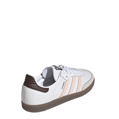 white adidas women's samba og with pale pink stripes and gum sole on a white background